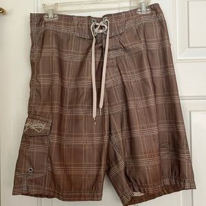 Billabong men's board shorts. Beige/brown plaid. Preowned.
